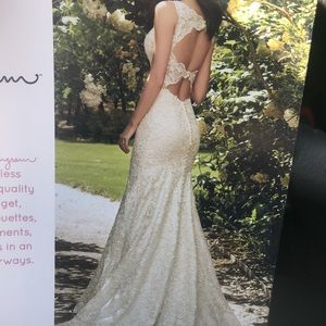 Rebecca Ingram gown is size 6 ivory in color all lace wore once needs cleaned